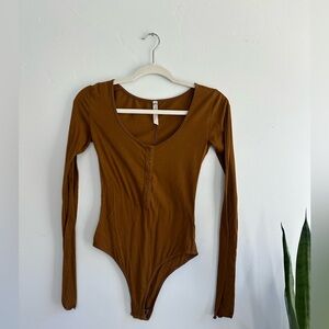 Free People long sleeve bodysuit. Size: XS